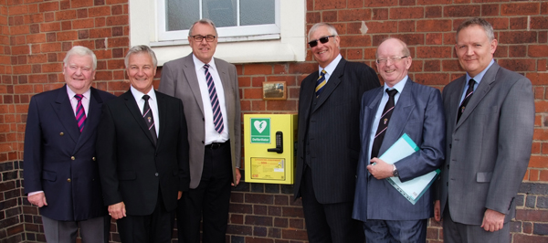 Mark Masons with the public access defibrillator at Hinckley Masonic Hall